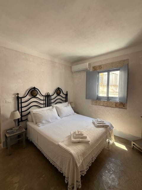 Bed, Photo of the whole room, Bedroom, towels, air conditioner