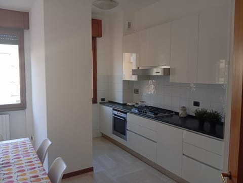 Kitchen or kitchenette, oven, stove