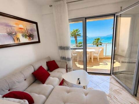 Patio, Bed, View (from property/room), Balcony/Terrace, Living room, Photo of the whole room, Seating area, Beach, Sea view