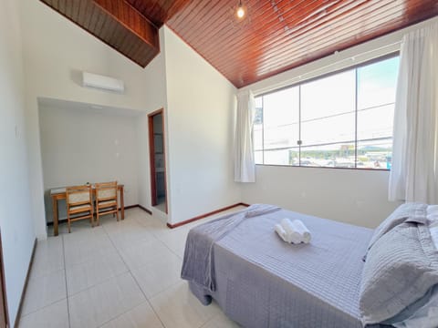 Bed, Photo of the whole room, Bedroom, towels, air conditioner