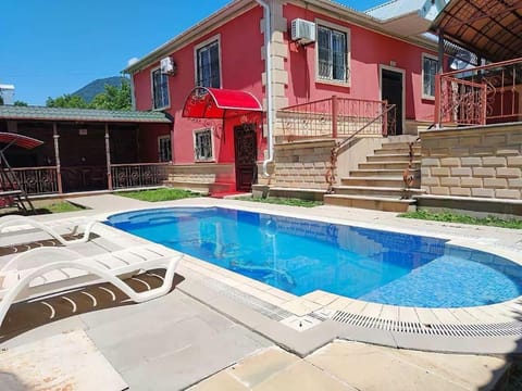 Property building, Patio, Day, Mountain view, Pool view, Swimming pool, sunbed