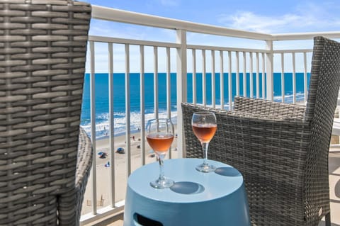 View (from property/room), Balcony/Terrace, Seating area, Beach, Sea view
