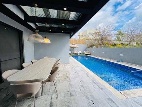 Patio, Day, Pool view, Swimming pool, sunbed