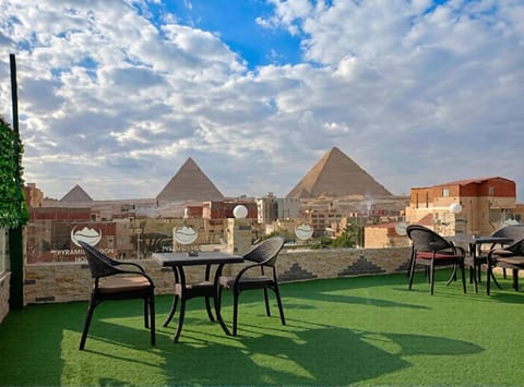 Property building, Patio, Day, Natural landscape, Dining area, sunbed