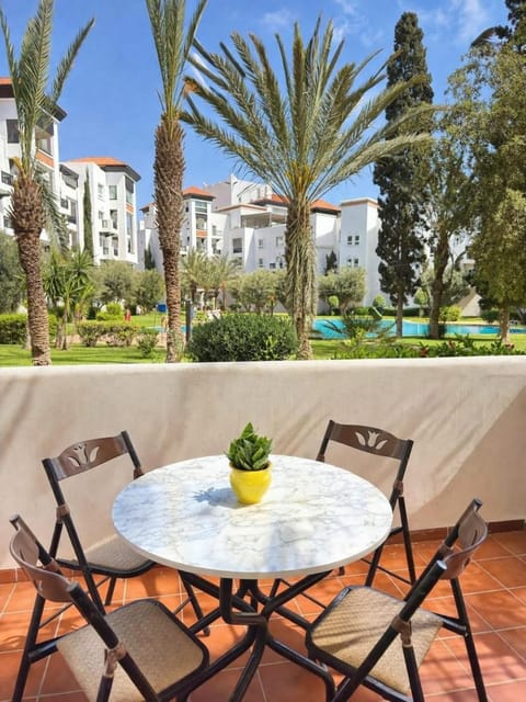 Property building, Patio, Spring, Day, Garden, View (from property/room), Balcony/Terrace, Dining area, Garden view, Pool view, Swimming pool