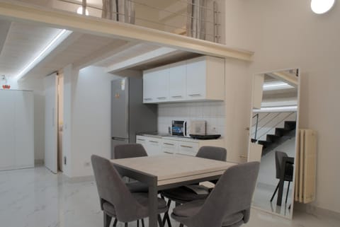 Seating area, Dining area, microwave, stove, kitchen