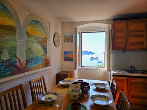 Kitchen or kitchenette, Living room, Seating area, Dining area, Sea view, Sunrise, Sunset