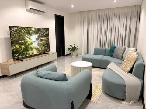 Communal lounge/ TV room, Living room, Seating area, air conditioner