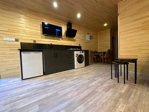Communal lounge/ TV room, kitchen