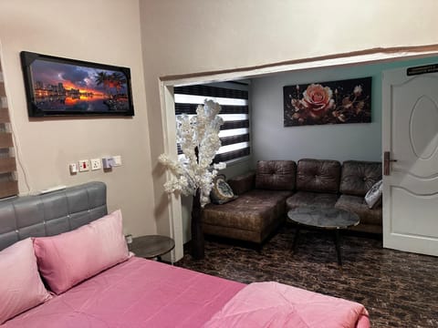 Bed, Living room, Seating area