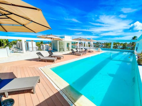 Property building, Day, View (from property/room), Pool view, Swimming pool, sunbed