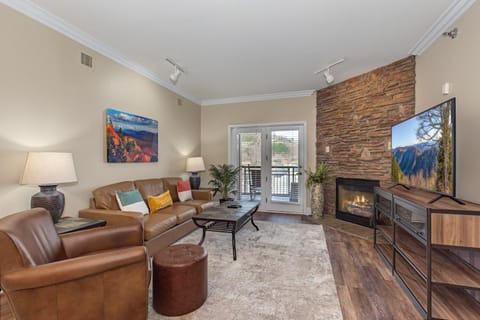 TV and multimedia, Living room, Seating area, fireplace, furniture, air conditioner