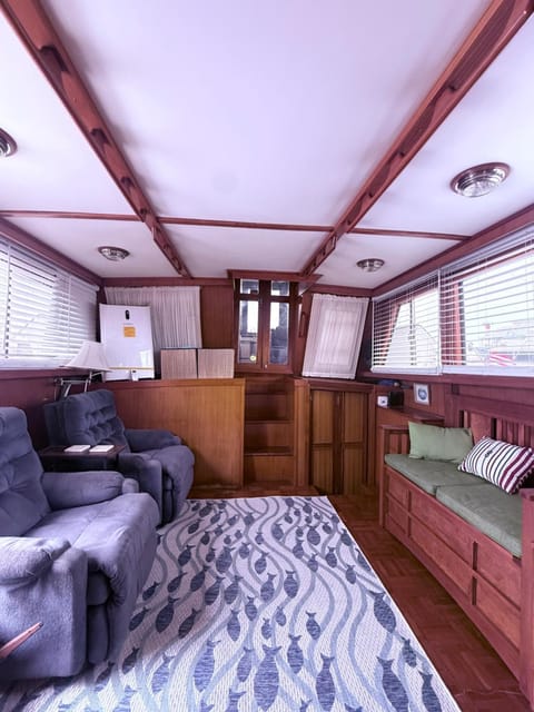 Classic boat sleeps up to 8 people Docked boat in Stock Island