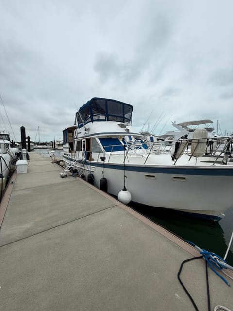 Classic boat sleeps up to 8 people Docked boat in Stock Island