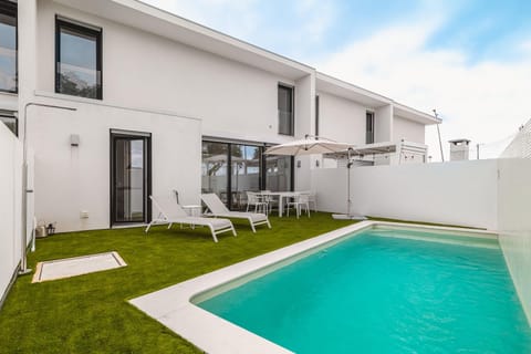 Property building, Living room, Swimming pool