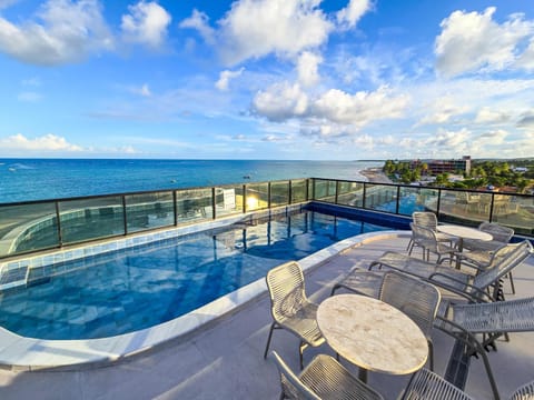 Property building, BBQ facilities, View (from property/room), Balcony/Terrace, Beach, City view, Garden view, Pool view, Pool view, Sea view, Sea view, Swimming pool, Swimming pool, Swimming pool, furniture, sunbed