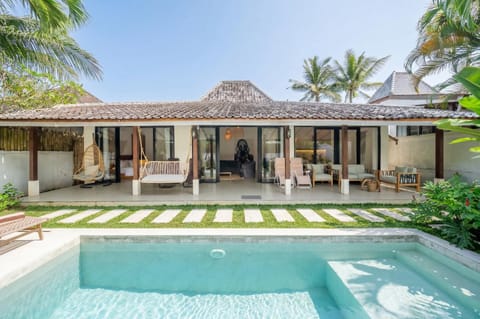 Property building, Patio, Seating area, Swimming pool