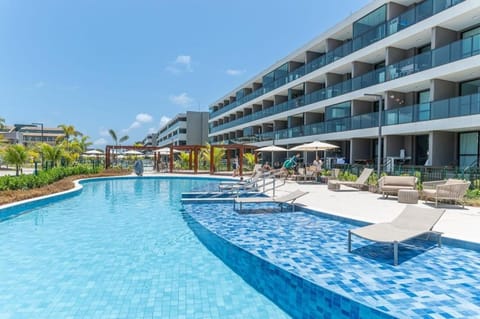 Property building, Day, Pool view, Swimming pool, sunbed