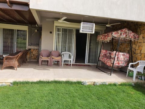 Property building, Patio, Garden, Seating area