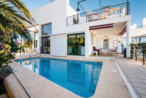 Property building, Living room, Swimming pool