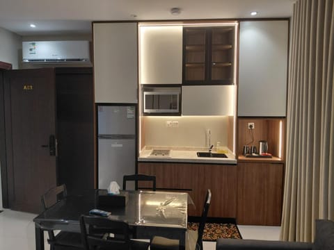 Property building, People, Property logo or sign, Bird's eye view, Coffee/tea facilities, View (from property/room), Kitchen or kitchenette, Dining area