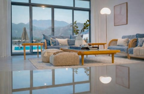 Natural landscape, Living room, Seating area, Mountain view, Pool view, Swimming pool