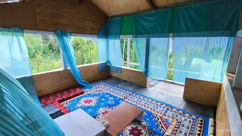 Property building, Communal lounge/ TV room, Seating area, sunbed