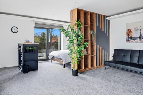 Bed, Living room, Seating area, Dining area