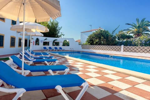 Property building, Living room, Swimming pool