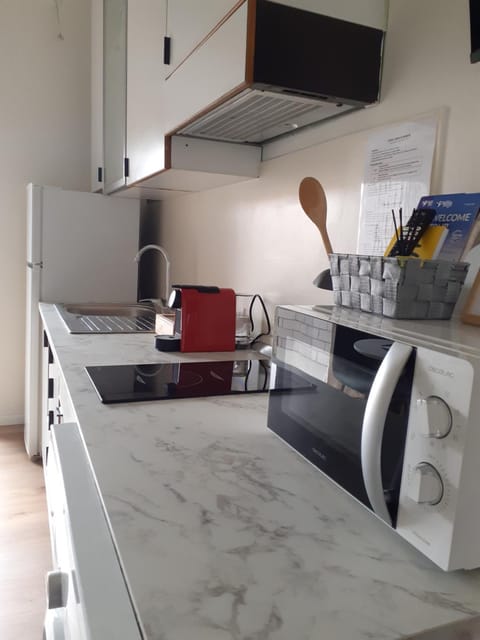 Kitchen or kitchenette, stove