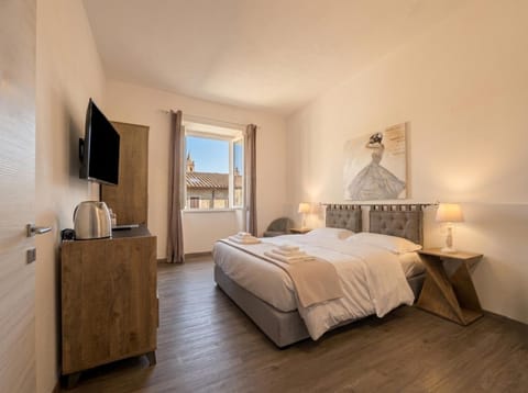 Property building, Bed, TV and multimedia, View (from property/room), Photo of the whole room, Bedroom, City view, towels, air conditioner