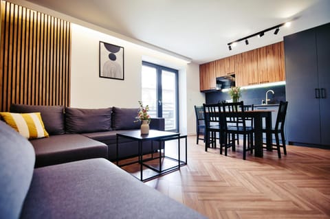 Kitchen or kitchenette, Living room, Seating area, Dining area