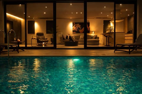 Living room, Seating area, Pool view, Swimming pool, sunbed