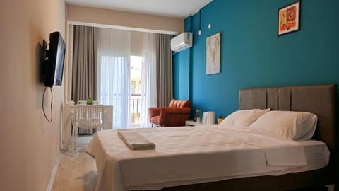 Balcony/Terrace, Living room, Other, Photo of the whole room, Bedroom, Food, Text overlay, furniture, towels, air conditioner