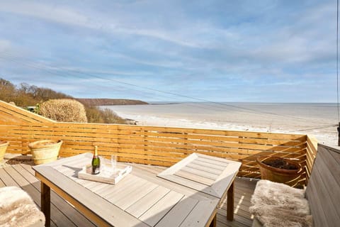View (from property/room), Balcony/Terrace, Seating area, Beach, Sea view