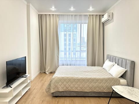 Bed, Living room, Seating area, Bedroom, air conditioner