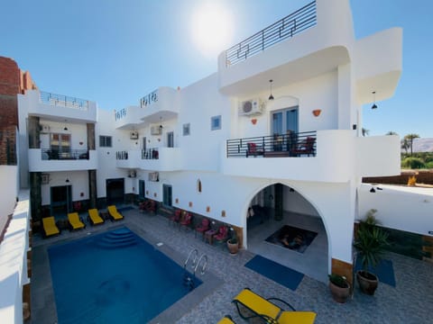 Property building, Day, View (from property/room), Balcony/Terrace, Seating area, Pool view, Swimming pool, sunbed