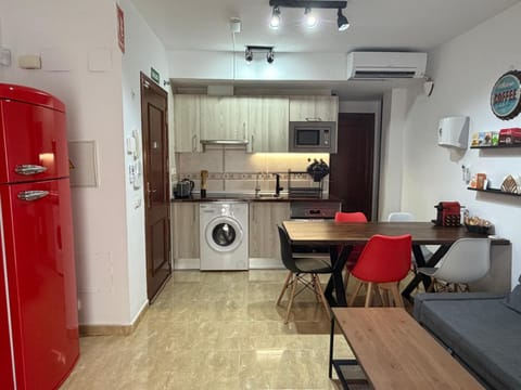 Kitchen or kitchenette, Dining area, oven, toaster, washing machine, air conditioner