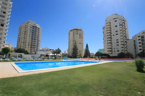 Property building, Living room, Swimming pool
