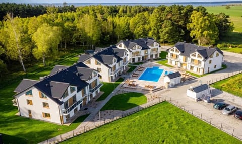 Property building, Spring, Day, Neighbourhood, Natural landscape, Bird's eye view, Pool view, Street view, Swimming pool, Location, sunbed