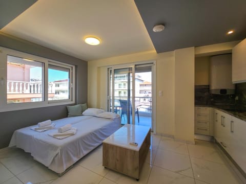 Bed, Kitchen or kitchenette, towels