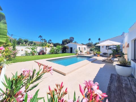 Property building, Living room, Swimming pool