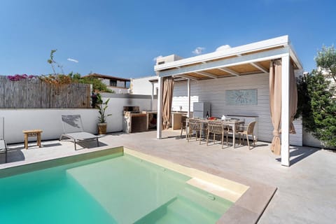 Property building, Living room, Swimming pool