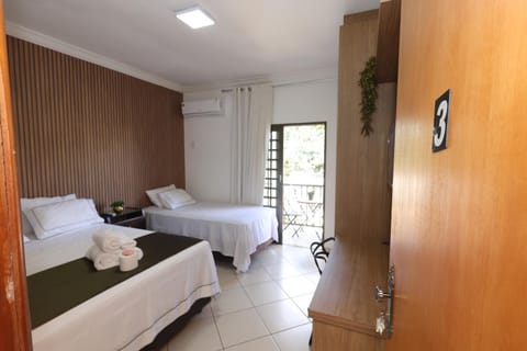 Bed, Bedroom, towels, wardrobe, air conditioner