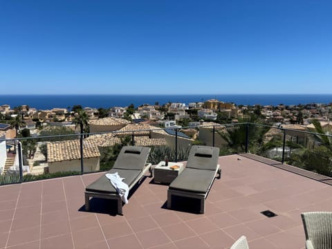 Facade/entrance, Solarium, Sea view, Swimming pool