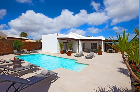 Property building, Living room, Swimming pool