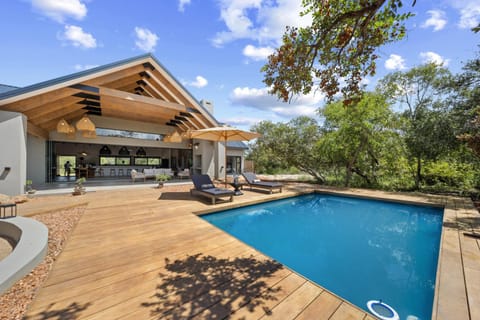 Property building, Patio, Garden, Pool view, Swimming pool