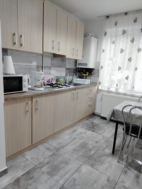 Kitchen or kitchenette, microwave, stove