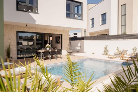 Property building, View (from property/room), Swimming pool, sunbed