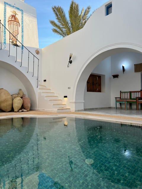Property building, Patio, Day, Pool view, Swimming pool